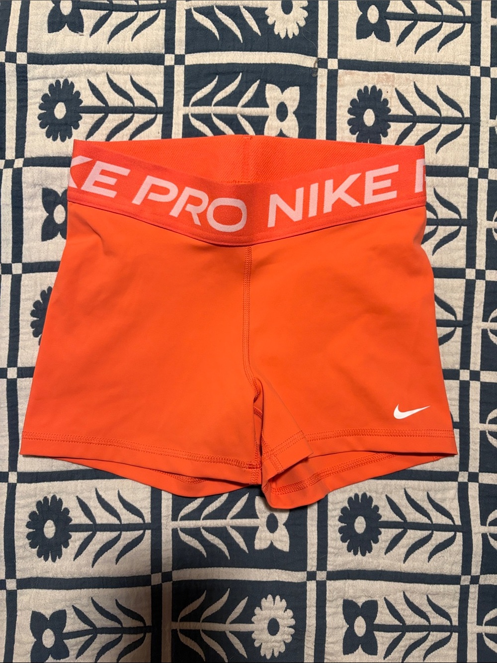 Womens peach Nike Pro running shorts